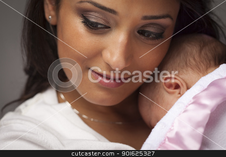 To use this stock image in your creative project, please select the size you need over to the right and click the "Add to Cart" button.
Your downloaded image will come with the Cutcaster watermark removed so don’t worry about the watermark you see on this page. Attractive Ethnic Woman with Her Newborn Baby stock photo, Young Attractive Ethnic Woman Holding Her Newborn Baby Under Dramatic Lighting. by Andy Dean
