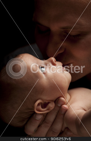 To use this stock image in your creative project, please select the size you need over to the right and click the "Add to Cart" button.
Your downloaded image will come with the Cutcaster watermark removed so don’t worry about the watermark you see on this page. Young Father Holding His Mixed Race Newborn Baby stock photo, Happy Young Father Holding His Mixed Race Newborn Baby Under Dramatic Lighting. by Andy Dean