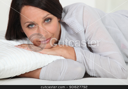 To use this stock image in your creative project, please select the size you need over to the right and click the "Add to Cart" button.
Your downloaded image will come with the Cutcaster watermark removed so don’t worry about the watermark you see on this page. Woman lying on her bed stock photo, Woman lying on her bed by photography33