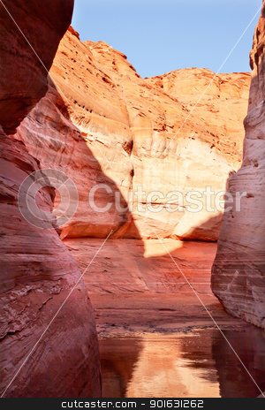 To use this stock image in your creative project, please select the size you need over to the right and click the "Add to Cart" button.
Your downloaded image will come with the Cutcaster watermark removed so don’t worry about the watermark you see on this page. Antelope Slot Canyon Reflection Lake Powell Arizona stock photo, Orange White Antelope Slot Canyon Water Reflection Abstract Glen Canyon Recreation Area Lake Powell Arizona by William Perry
