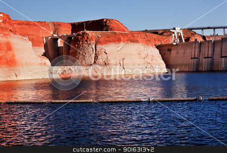To use this stock image in your creative project, please select the size you need over to the right and click the "Add to Cart" button.
Your downloaded image will come with the Cutcaster watermark removed so don’t worry about the watermark you see on this page. Glen Canyon Dam Lake Powell Canyon Walls Arizona stock photo, Glen Canyon Dam Lake Powell Orange Yellow Canyon Walls Reflections Arizona by William Perry