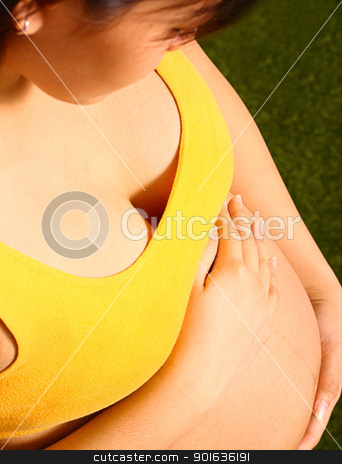 To use this stock image in your creative project, please select the size you need over to the right and click the "Add to Cart" button.
Your downloaded image will come with the Cutcaster watermark removed so don’t worry about the watermark you see on this page. Pregnant Woman Holding Her Stomach stock photo, Expectant Mother Holding Her Stomach by stuartmiles