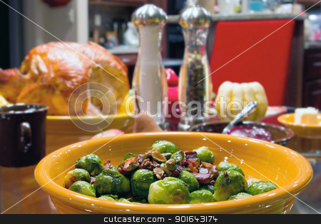 To use this stock image in your creative project, please select the size you need over to the right and click the "Add to Cart" button.
Your downloaded image will come with the Cutcaster watermark removed so don’t worry about the watermark you see on this page. Brussels Sprouts with Bacon and Pistachios Turkey Dinner stock photo, Brussels Sprouts with Bacon and Pistachios Turkey Dinner Table Setting by Jit Lim