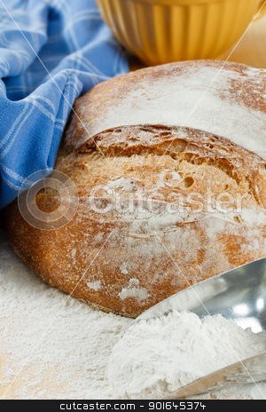 To use this stock image in your creative project, please select the size you need over to the right and click the "Add to Cart" button.
Your downloaded image will come with the Cutcaster watermark removed so don’t worry about the watermark you see on this page. Crusty Artisan Bread With Wheat Flour stock photo, Close up of fresh baked artisan bread with enriched wheat flour in foreground by Karen Sarraga