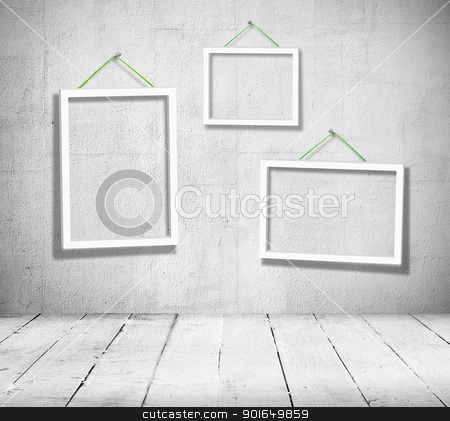 To use this stock image in your creative project, please select the size you need over to the right and click the "Add to Cart" button.
Your downloaded image will come with the Cutcaster watermark removed so don’t worry about the watermark you see on this page. Vintage room stock photo, Three empty wooden frames for paintings hang in black and white vintage room on the wall by Imaster