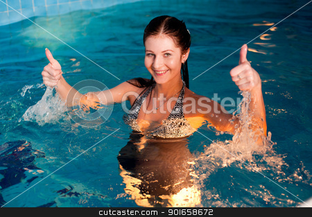 To use this stock image in your creative project, please select the size you need over to the right and click the "Add to Cart" button.
Your downloaded image will come with the Cutcaster watermark removed so don’t worry about the watermark you see on this page. Attractive girl in swimming pool stock photo, Young beautiful woman relaxing in swimming pool by Aikon