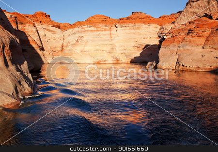 To use this stock image in your creative project, please select the size you need over to the right and click the "Add to Cart" button.
Your downloaded image will come with the Cutcaster watermark removed so don’t worry about the watermark you see on this page. Orange Antelope Canyon Blue Water Reflection Lake Powell Arizona stock photo, Orange Pink Canyon Blue Orange Water Reflection Glen Canyon Recreation Area Lake Powell Antelope Canyon Arizona by William Perry