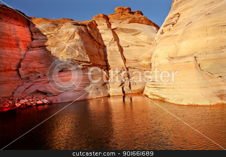 To use this stock image in your creative project, please select the size you need over to the right and click the "Add to Cart" button.
Your downloaded image will come with the Cutcaster watermark removed so don’t worry about the watermark you see on this page. Orange Pink Antelope Canyon Reflection Lake Powell Arizona stock photo, Orange Pink Canyon Bronze Water Reflection Abstract Glen Canyon Recreation Area Lake Powell Antelope Canyon Arizona by William Perry