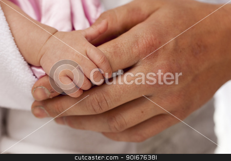 To use this stock image in your creative project, please select the size you need over to the right and click the "Add to Cart" button.
Your downloaded image will come with the Cutcaster watermark removed so don’t worry about the watermark you see on this page. Baby Girl Hand Holding Rough Finger of Dad stock photo, Baby Girl Tiny Hand Holding Rough Finger of Dad. by Andy Dean