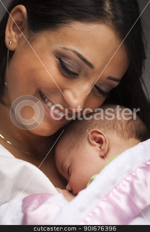 To use this stock image in your creative project, please select the size you need over to the right and click the "Add to Cart" button.
Your downloaded image will come with the Cutcaster watermark removed so don’t worry about the watermark you see on this page. Attractive Ethnic Woman with Her Newborn Baby stock photo, Young Attractive Ethnic Woman Holding Her Newborn Baby Under Dramatic Lighting. by Andy Dean