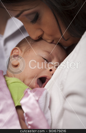 To use this stock image in your creative project, please select the size you need over to the right and click the "Add to Cart" button.
Your downloaded image will come with the Cutcaster watermark removed so don’t worry about the watermark you see on this page. Attractive Ethnic Woman with Her Yawning Newborn Baby stock photo, Young Attractive Ethnic Woman Holding Her Yawning Newborn Baby. by Andy Dean