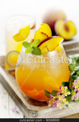 To use this stock image in your creative project, please select the size you need over to the right and click the "Add to Cart" button.
Your downloaded image will come with the Cutcaster watermark removed so don’t worry about the watermark you see on this page. peach cocktail stock photo, refreshing summer cocktail, made with peach by Liv Friis-Larsen