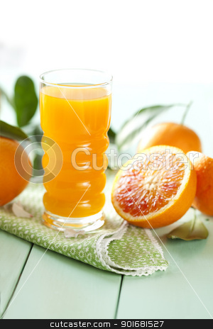 To use this stock image in your creative project, please select the size you need over to the right and click the "Add to Cart" button.
Your downloaded image will come with the Cutcaster watermark removed so don’t worry about the watermark you see on this page. orange juice stock photo, freshly pressed orange juice by Liv Friis-Larsen