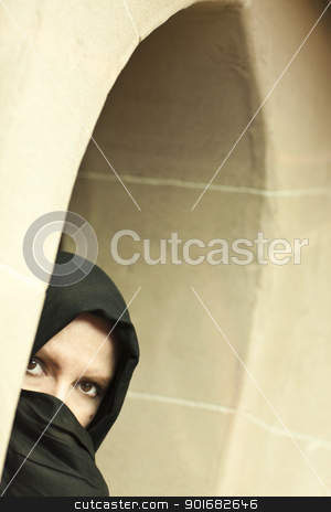 To use this stock image in your creative project, please select the size you need over to the right and click the "Add to Cart" button.
Your downloaded image will come with the Cutcaster watermark removed so don’t worry about the watermark you see on this page. Cautious Islamic Woman in Window Pane Wearing Burqa or Niqab stock photo, Cautious Islamic Woman in a Window Pane Wearing Traditional Burqa or Niqab. by Andy Dean