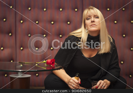 To use this stock image in your creative project, please select the size you need over to the right and click the "Add to Cart" button.
Your downloaded image will come with the Cutcaster watermark removed so don’t worry about the watermark you see on this page. Sensual Blonde Woman Sitting Near Champagne and Rose stock photo, Sensual Beautiful Blonde Woman Sitting Near Champagne and Rose. by Andy Dean