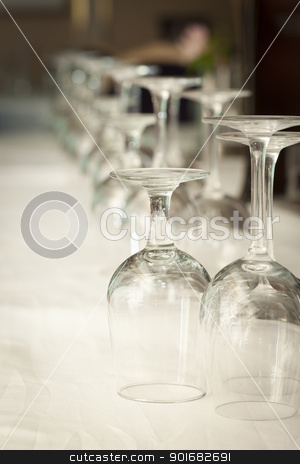 To use this stock image in your creative project, please select the size you need over to the right and click the "Add to Cart" button.
Your downloaded image will come with the Cutcaster watermark removed so don’t worry about the watermark you see on this page. Drinking Glasses Abstract in Formal Dining Room stock photo, Several Drinking Glasses Abstract in Formal Dining Room Setting. by Andy Dean