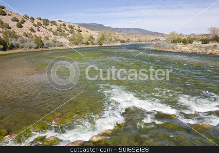 To use this stock image in your creative project, please select the size you need over to the right and click the "Add to Cart" button.
Your downloaded image will come with the Cutcaster watermark removed so don’t worry about the watermark you see on this page. Green River at Browns Park, Utah stock photo, Green River at Bridge Hollow, Browns Park, Utah below Flaming Gorge Dam, springtime, looking downstream by Marek Uliasz