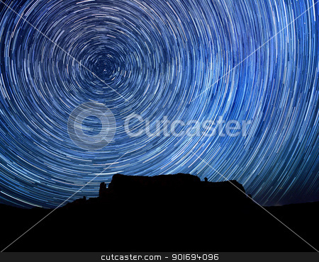 To use this stock image in your creative project, please select the size you need over to the right and click the "Add to Cart" button.
Your downloaded image will come with the Cutcaster watermark removed so don’t worry about the watermark you see on this page. Long Exposure Star Trail Image at Night stock photo, Monument Valley Long Exposure Star Trail Image by Katrina Brown