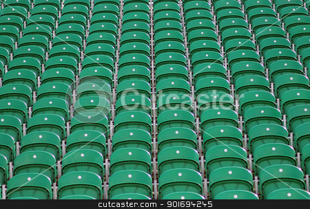 To use this stock image in your creative project, please select the size you need over to the right and click the "Add to Cart" button.
Your downloaded image will come with the Cutcaster watermark removed so don’t worry about the watermark you see on this page. Seating in stadium stock photo, Rows of green seats in outdoors stadium or arena. by Martin Crowdy