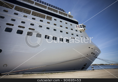To use this stock image in your creative project, please select the size you need over to the right and click the "Add to Cart" button.
Your downloaded image will come with the Cutcaster watermark removed so don’t worry about the watermark you see on this page. Cruise ship in port stock photo, Large white cruise ship anchored in port by Ints Vikmanis