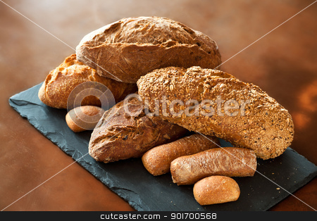 To use this stock image in your creative project, please select the size you need over to the right and click the "Add to Cart" button.
Your downloaded image will come with the Cutcaster watermark removed so don’t worry about the watermark you see on this page. Assortment of Traditional Breads. stock photo, Assortment of traditional whole wheat, cereal and brown bread. by karel noppe