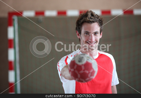 To use this stock image in your creative project, please select the size you need over to the right and click the "Add to Cart" button.
Your downloaded image will come with the Cutcaster watermark removed so don’t worry about the watermark you see on this page. player holding ball stock photo, player holding ball by photography33