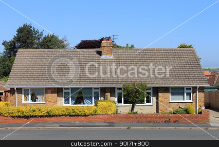 To use this stock image in your creative project, please select the size you need over to the right and click the "Add to Cart" button.
Your downloaded image will come with the Cutcaster watermark removed so don’t worry about the watermark you see on this page. English bungalow houses on estate. stock photo, Two semidetached English bungalow houses on estate. by Martin Crowdy