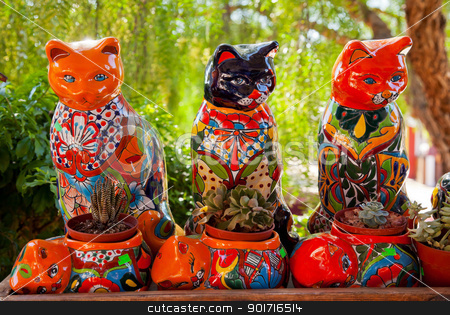 To use this stock image in your creative project, please select the size you need over to the right and click the "Add to Cart" button.
Your downloaded image will come with the Cutcaster watermark removed so don’t worry about the watermark you see on this page. Mexican Colorful Souvenir Ceramic Cats Cactus Pots San Diego Cal stock photo, Meixan Colorful Souvenir Ceramic Cats Cactus Pots San Diego California by William Perry