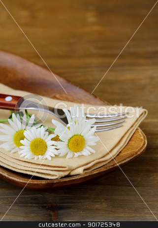 To use this stock image in your creative project, please select the size you need over to the right and click the "Add to Cart" button.
Your downloaded image will come with the Cutcaster watermark removed so don’t worry about the watermark you see on this page. wooden plate and daisy on wooden background stock photo, wooden plate and daisy on wooden background by Olga Kriger