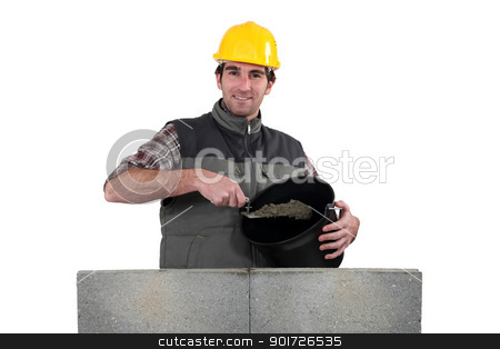 To use this stock image in your creative project, please select the size you need over to the right and click the "Add to Cart" button.
Your downloaded image will come with the Cutcaster watermark removed so don’t worry about the watermark you see on this page. Bricklayer with a bucket of cement stock photo, Bricklayer with a bucket of cement by photography33