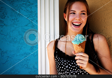 To use this stock image in your creative project, please select the size you need over to the right and click the "Add to Cart" button.
Your downloaded image will come with the Cutcaster watermark removed so don’t worry about the watermark you see on this page. Young Woman Eating Ice Cream Outside stock photo, Happy young woman eating ice cream outside by Stephanie Zieber