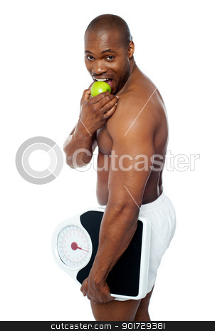 To use this stock image in your creative project, please select the size you need over to the right and click the "Add to Cart" button.
Your downloaded image will come with the Cutcaster watermark removed so don’t worry about the watermark you see on this page. Young man enjoying fresh green apple stock photo, Young man enjoying fresh green apple and holding weighing scale in one hand by Ishay Botbol