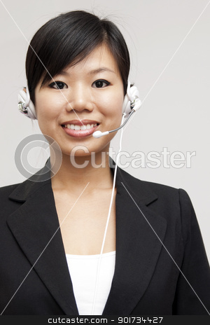 To use this stock image in your creative project, please select the size you need over to the right and click the "Add to Cart" button.
Your downloaded image will come with the Cutcaster watermark removed so don’t worry about the watermark you see on this page. Customer Representative stock photo, Friendly Customer Representative with headset smiling during a telephone conversation by szefei
