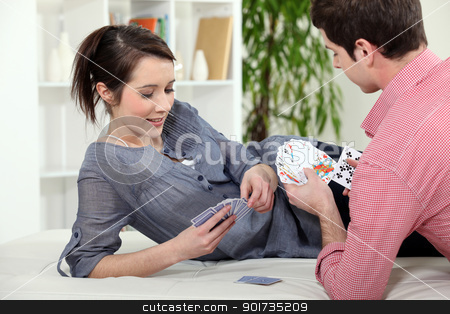 To use this stock image in your creative project, please select the size you need over to the right and click the "Add to Cart" button.
Your downloaded image will come with the Cutcaster watermark removed so don’t worry about the watermark you see on this page. Couple playing cards stock photo, Couple playing cards by photography33
