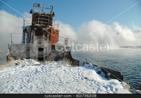 To use this stock image in your creative project, please select the size you need over to the right and click the "Add to Cart" button.
Your downloaded image will come with the Cutcaster watermark removed so don’t worry about the watermark you see on this page. Siberia. Winter. A fog. stock photo, Old a river vessel. A fog. The river Yenisei in the winter. by Yury Ponomarev