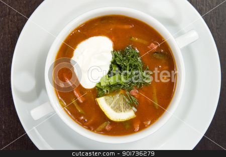 To use this stock image in your creative project, please select the size you need over to the right and click the "Add to Cart" button.
Your downloaded image will come with the Cutcaster watermark removed so don’t worry about the watermark you see on this page. Vegetable soup. stock photo, Vegetable soup on a white plate. by Yury Ponomarev