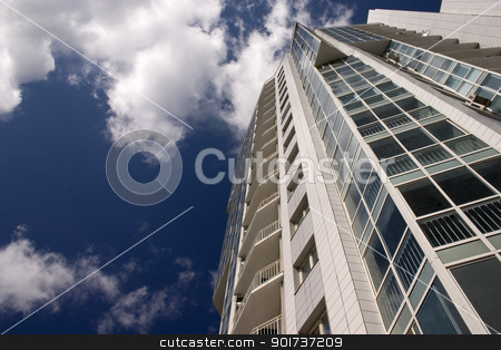 To use this stock image in your creative project, please select the size you need over to the right and click the "Add to Cart" button.
Your downloaded image will come with the Cutcaster watermark removed so don’t worry about the watermark you see on this page. Modern Condominium. stock photo, Modern urban building. Glass balconies. by Yury Ponomarev