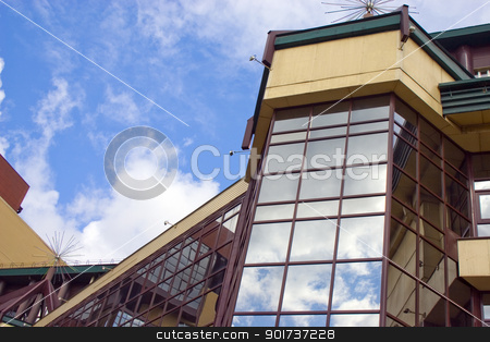 To use this stock image in your creative project, please select the size you need over to the right and click the "Add to Cart" button.
Your downloaded image will come with the Cutcaster watermark removed so don’t worry about the watermark you see on this page. Modern Architecture. stock photo, Modern building from a brick. Glass windows. by Yury Ponomarev