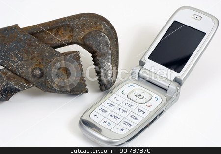 To use this stock image in your creative project, please select the size you need over to the right and click the "Add to Cart" button.
Your downloaded image will come with the Cutcaster watermark removed so don’t worry about the watermark you see on this page. Spanner and telephone. stock photo, Old spanner and modern telephone. by Yury Ponomarev