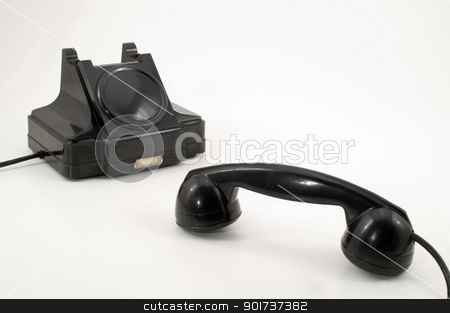 To use this stock image in your creative project, please select the size you need over to the right and click the "Add to Cart" button.
Your downloaded image will come with the Cutcaster watermark removed so don’t worry about the watermark you see on this page. Old Phone. stock photo, The old telephone of black colour on a white background. by Yury Ponomarev