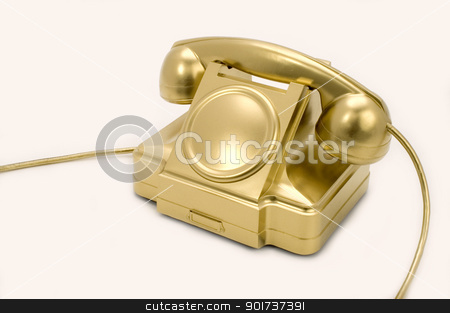 To use this stock image in your creative project, please select the size you need over to the right and click the "Add to Cart" button.
Your downloaded image will come with the Cutcaster watermark removed so don’t worry about the watermark you see on this page. The gold telephone. stock photo, The telephone of gold colour on a white background. by Yury Ponomarev