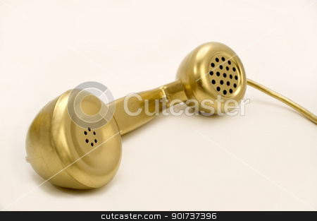 To use this stock image in your creative project, please select the size you need over to the right and click the "Add to Cart" button.
Your downloaded image will come with the Cutcaster watermark removed so don’t worry about the watermark you see on this page. The gold telephone. stock photo, The telephone of gold colour on a white background. by Yury Ponomarev