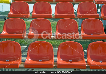 To use this stock image in your creative project, please select the size you need over to the right and click the "Add to Cart" button.
Your downloaded image will come with the Cutcaster watermark removed so don’t worry about the watermark you see on this page. Red seats. stock photo, Lines of red seats. by Yury Ponomarev