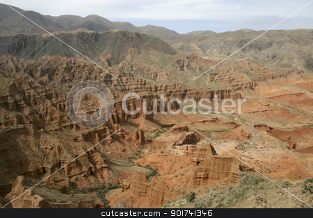To use this stock image in your creative project, please select the size you need over to the right and click the "Add to Cart" button.
Your downloaded image will come with the Cutcaster watermark removed so don’t worry about the watermark you see on this page. Red canyon. stock photo, Valley of red mountains. by Yury Ponomarev