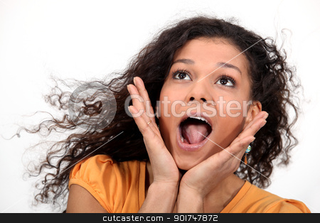 To use this stock image in your creative project, please select the size you need over to the right and click the "Add to Cart" button.
Your downloaded image will come with the Cutcaster watermark removed so don’t worry about the watermark you see on this page. A cute African American woman screaming. stock photo, A cute African American woman screaming. by photography33
