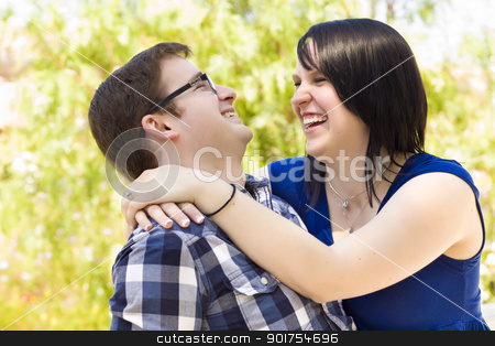 To use this stock image in your creative project, please select the size you need over to the right and click the "Add to Cart" button.
Your downloaded image will come with the Cutcaster watermark removed so don’t worry about the watermark you see on this page. Young Couple Having Fun in the Park stock photo, Attractive Young Couple Having Fun Outside in the Park by Andy Dean