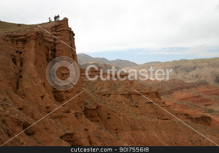 To use this stock image in your creative project, please select the size you need over to the right and click the "Add to Cart" button.
Your downloaded image will come with the Cutcaster watermark removed so don’t worry about the watermark you see on this page. Travel. The mountain country. stock photo, Travel in mountains of Kyrgyzstan. A red canyon. by Yury Ponomarev