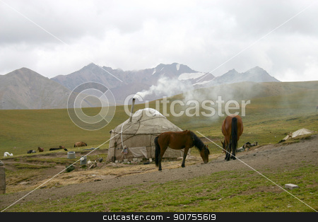 To use this stock image in your creative project, please select the size you need over to the right and click the "Add to Cart" button.
Your downloaded image will come with the Cutcaster watermark removed so don’t worry about the watermark you see on this page. . stock photo, Kyrgyzstan. The horses on a background of a mountain landscape. by Yury Ponomarev
