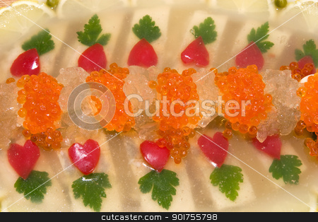 To use this stock image in your creative project, please select the size you need over to the right and click the "Add to Cart" button.
Your downloaded image will come with the Cutcaster watermark removed so don’t worry about the watermark you see on this page. Jellied fish with caviar. stock photo, Fish jellied with red caviar. by Yury Ponomarev