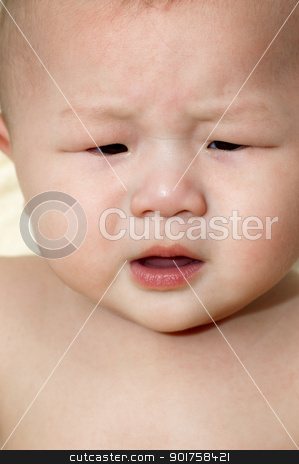To use this stock image in your creative project, please select the size you need over to the right and click the "Add to Cart" button.
Your downloaded image will come with the Cutcaster watermark removed so don’t worry about the watermark you see on this page. Crying baby. stock photo, An upset Asian baby boy is crying. by szefei
